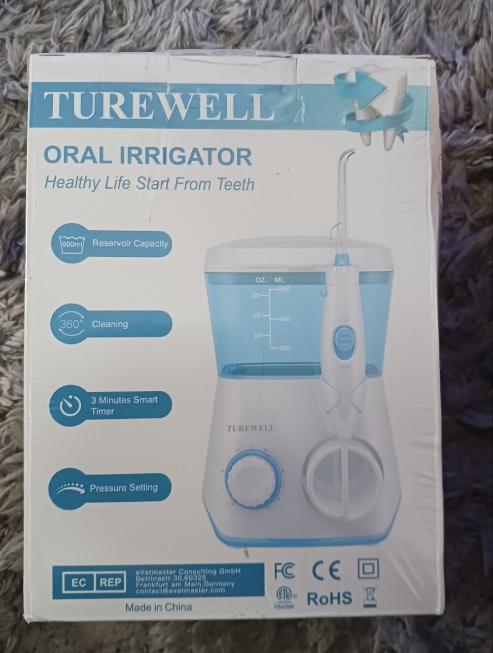 Turewell Oral Irrigator Water Flosser in White & Light Blue